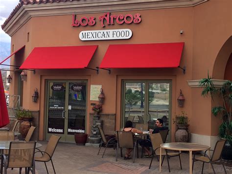 Los arcos mexican grill - Homemade chips topped with refried beans, nacho cheese, lettuce, tomato, sour cream, guacamole and jalapeño peppers served with your choice of meat (Al pastor, chicken, ground beef, veggies or steak) $16.00 +. 